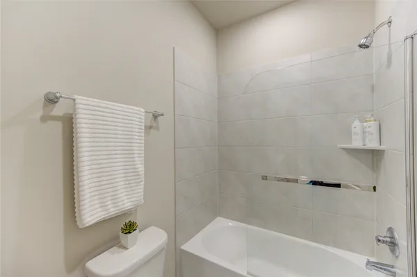 a bathroom with a sink and a bathtub