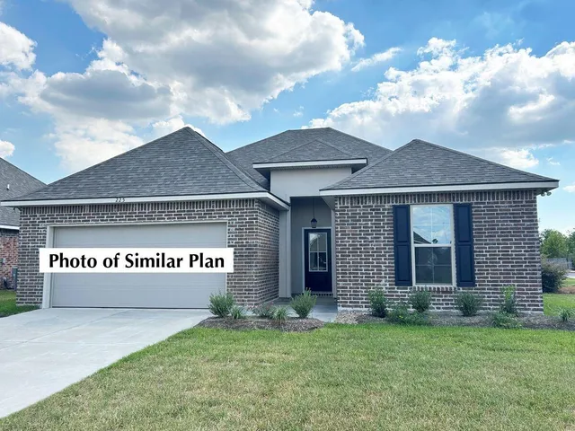 a view of a house with a garden