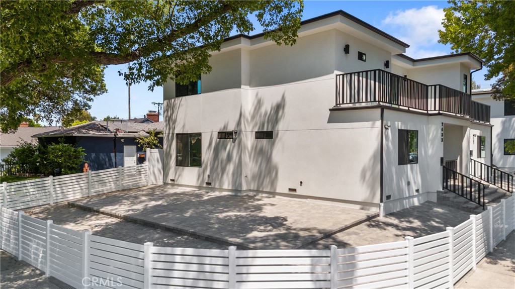 13901 Runnymede Street Van Nuys, CA 91405 - Photo 2 of 47 a view of a house with a small yard and plants