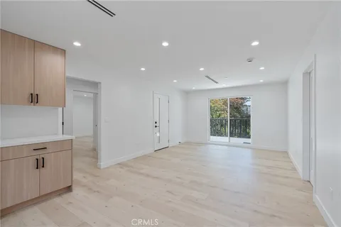 a view of a room that has a window