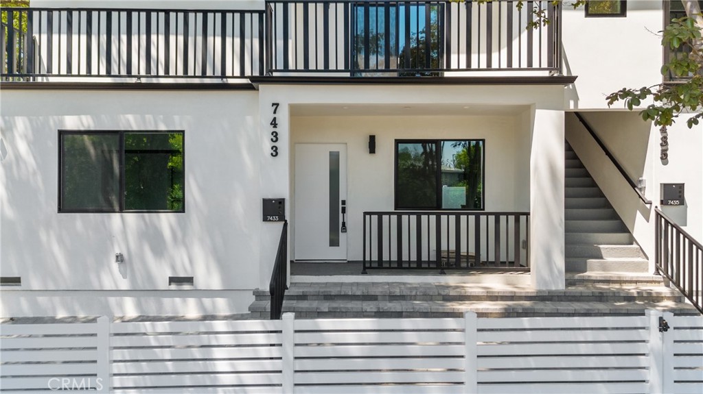 13901 Runnymede Street Van Nuys, CA 91405 - Photo 5 of 47 a view of a house with a balcony