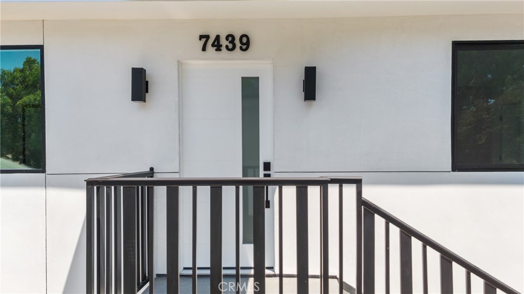 13901 Runnymede Street Van Nuys, CA 91405 - Photo 6 of 47 a view of a hallway with wooden floor