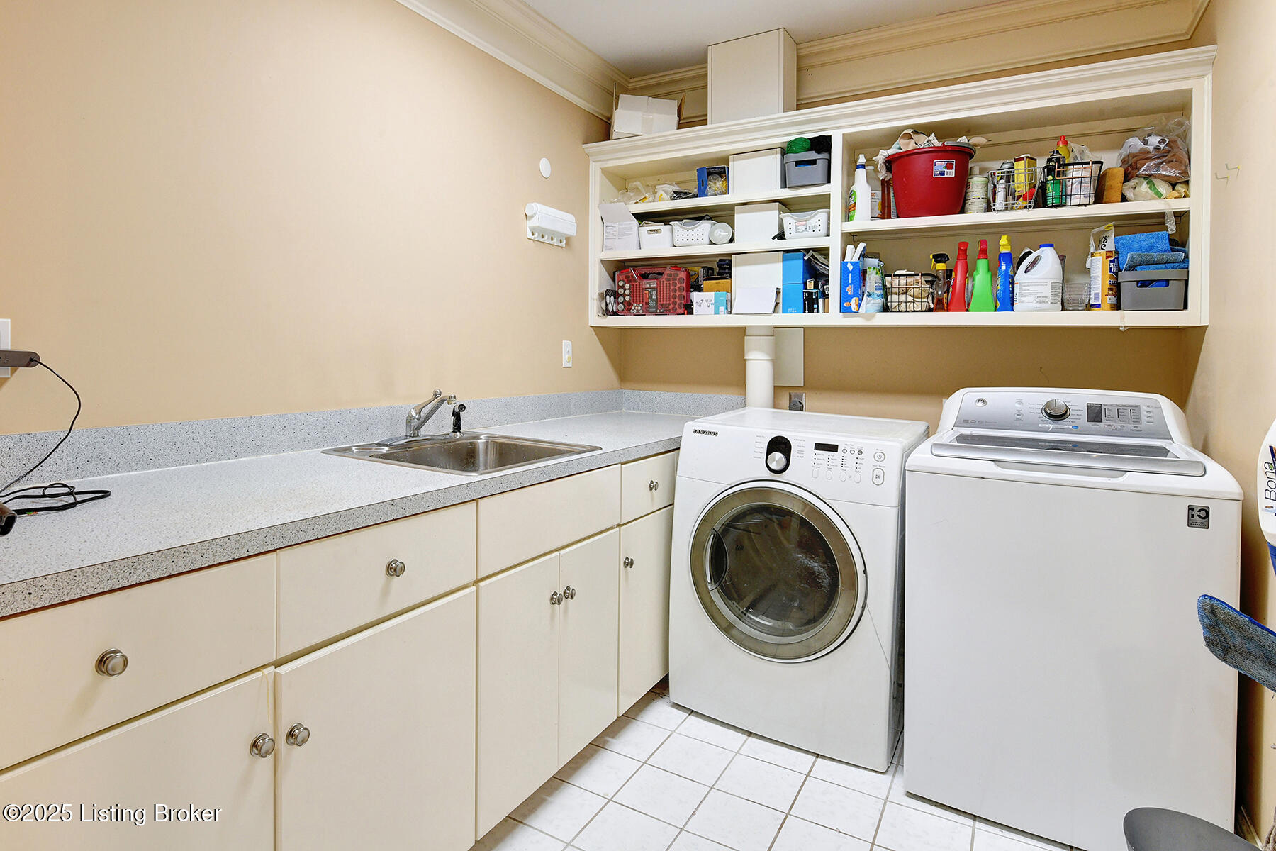 4226 Dolphin Road Louisville, KY 40220 - Photo 66 of 125 2nd Floor Laundry with storage shelving and cabinets