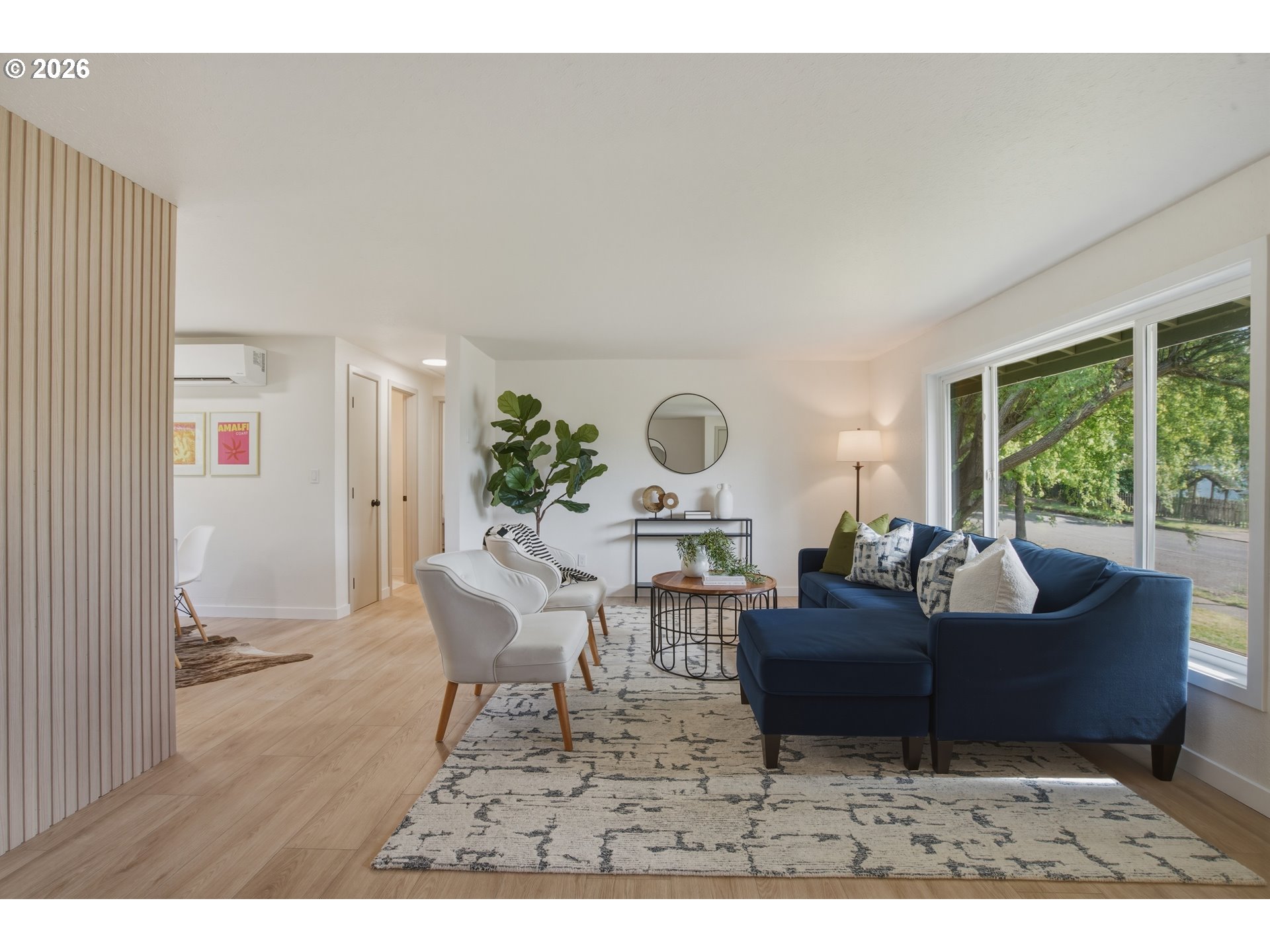 3455 Potter Street Eugene, OR 97405 - Photo 5 of 36 a living room with furniture and a large window