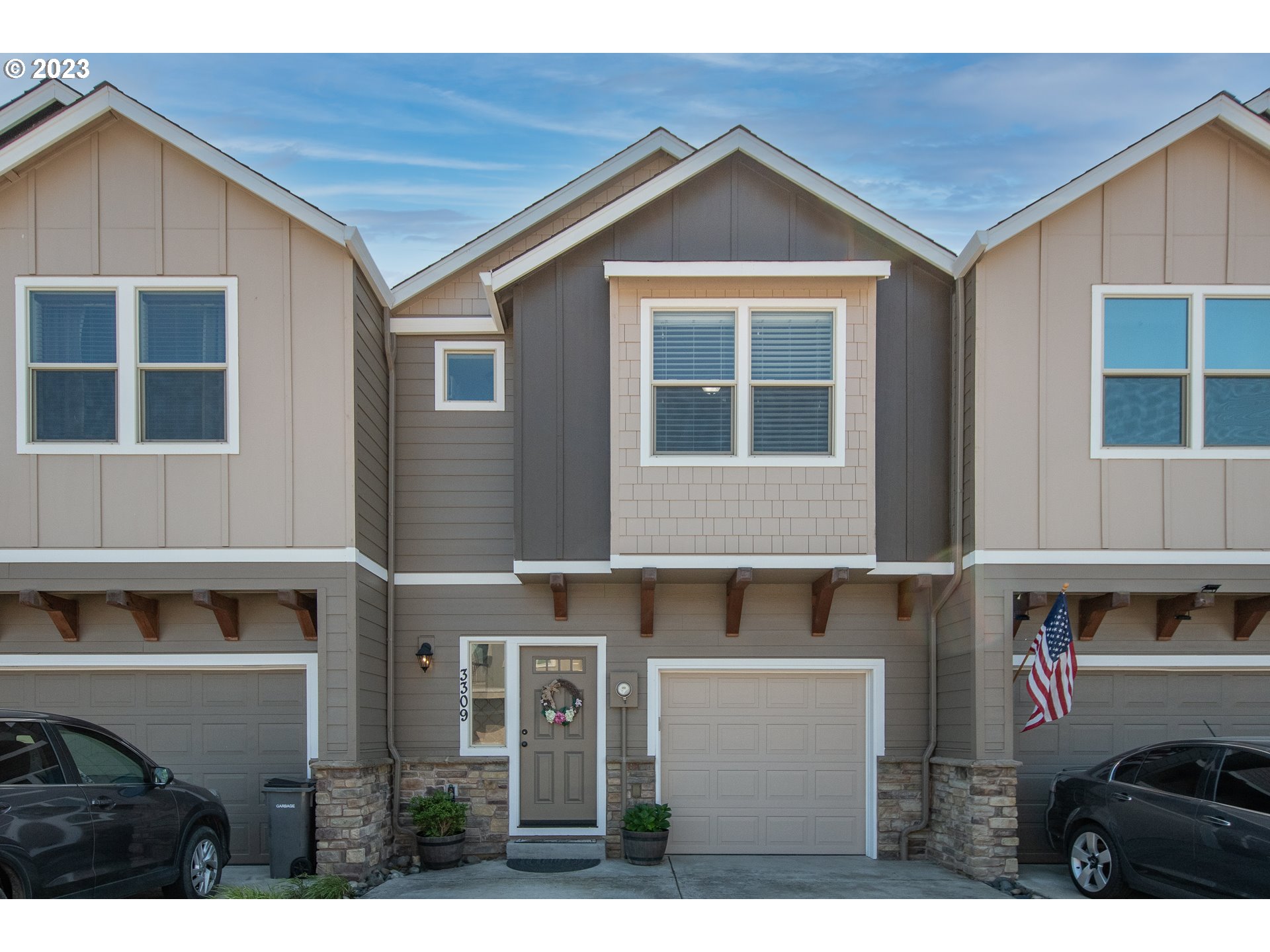 3309 North 3rd Street Ridgefield, WA 98642 - Photo 1 of 36 a front view of a house with a yard
