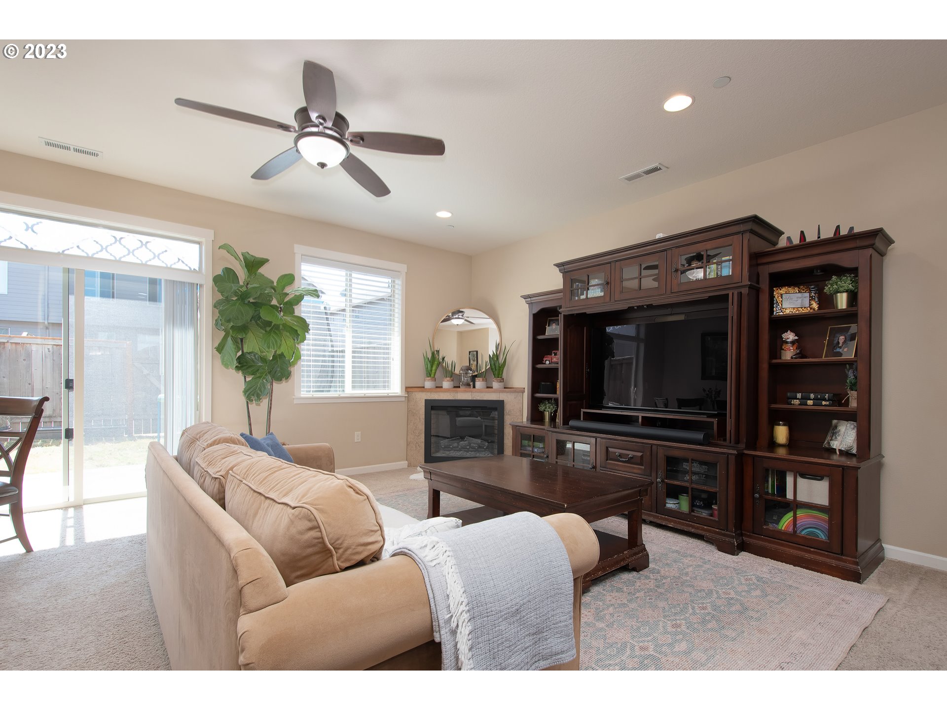 3309 North 3rd Street Ridgefield, WA 98642 - Photo 11 of 36 a living room with furniture and a flat screen tv