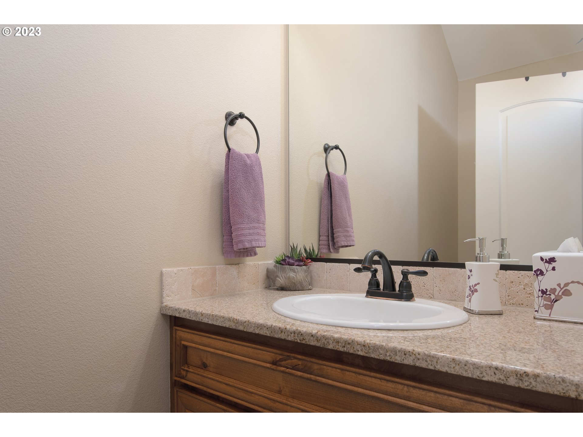 3309 North 3rd Street Ridgefield, WA 98642 - Photo 16 of 36 a bathroom with a sink and a mirror