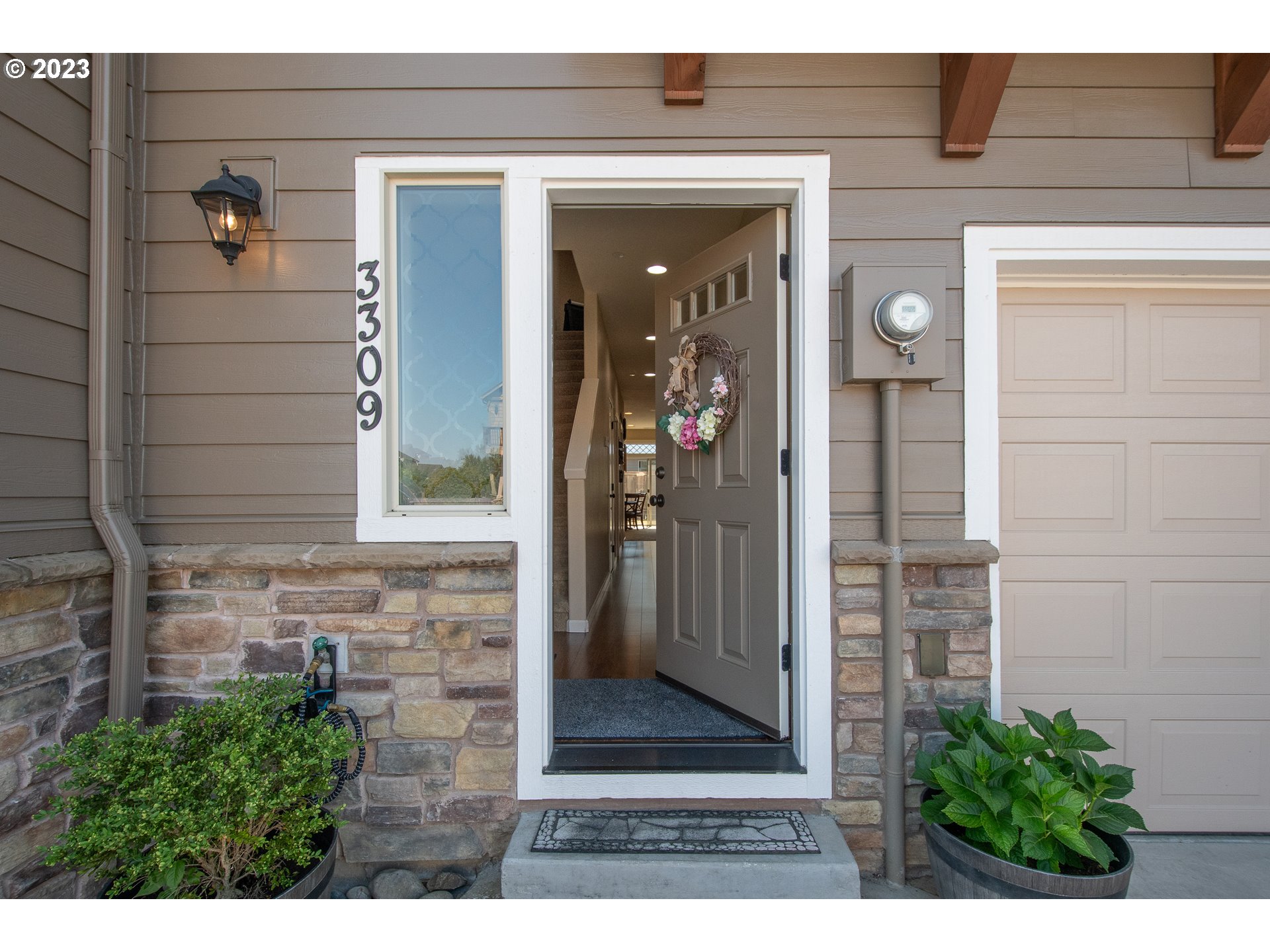 3309 North 3rd Street Ridgefield, WA 98642 - Photo 2 of 36 a view of front door of house and living room