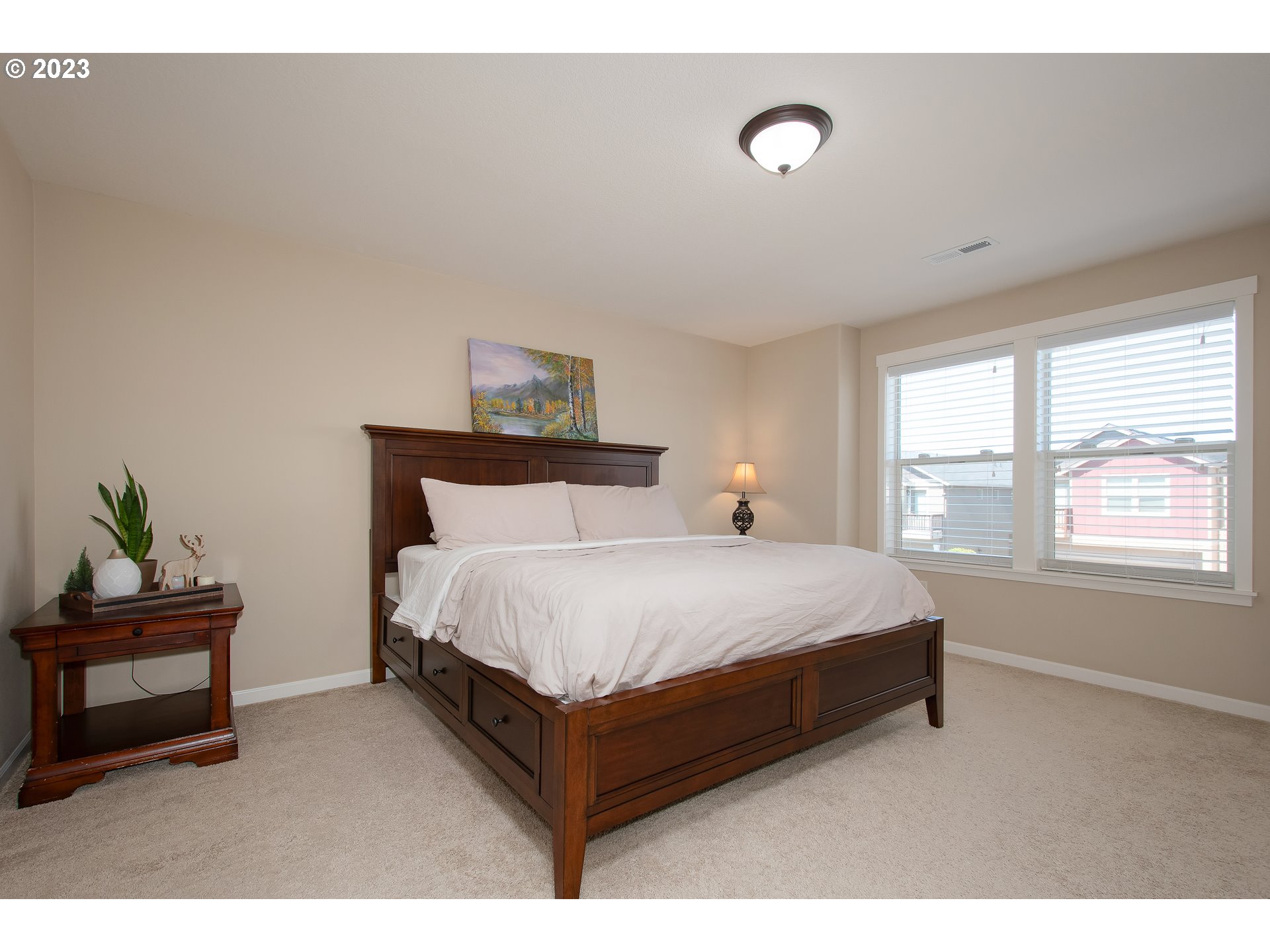 3309 North 3rd Street Ridgefield, WA 98642 - Photo 21 of 36 a bedroom with a bed and a window
