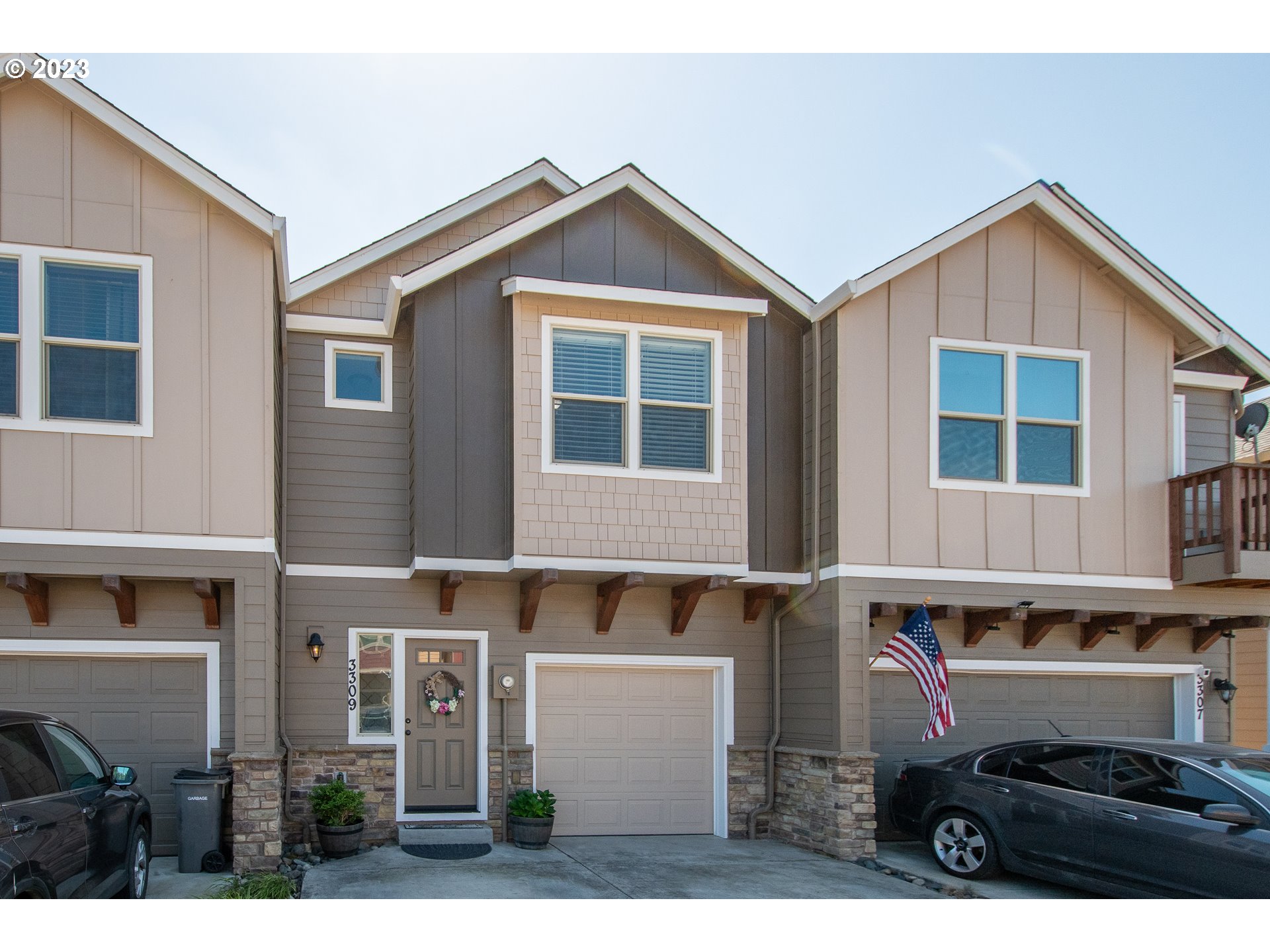 3309 North 3rd Street Ridgefield, WA 98642 - Photo 35 of 36 a front view of a house with a yard and balcony
