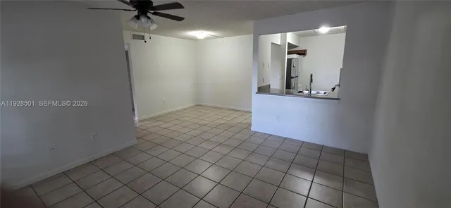 an empty room with mirror