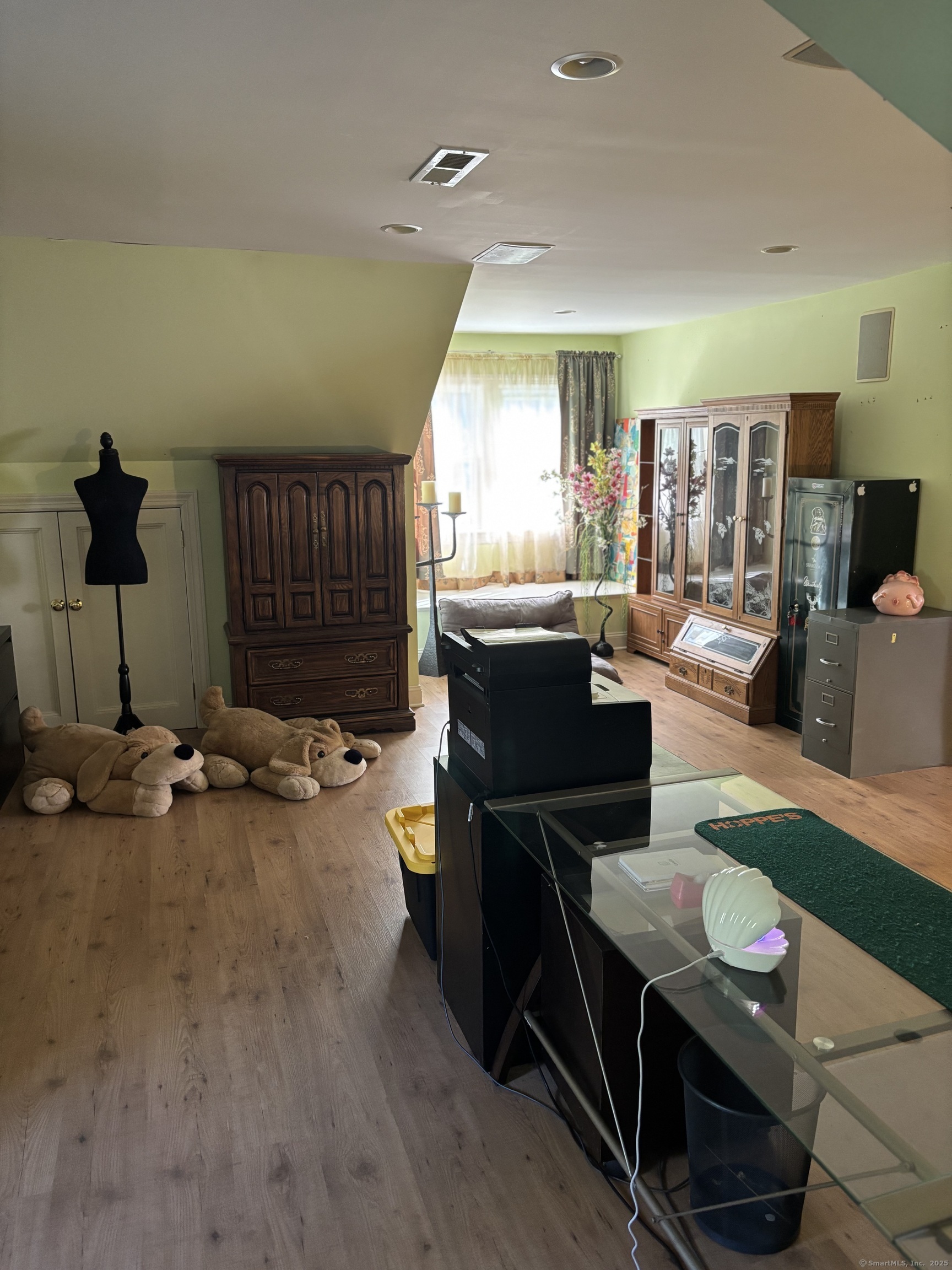 26 Olmstead Road Redding, CT 06896 - Photo 12 of 18 a living room with furniture and a fireplace