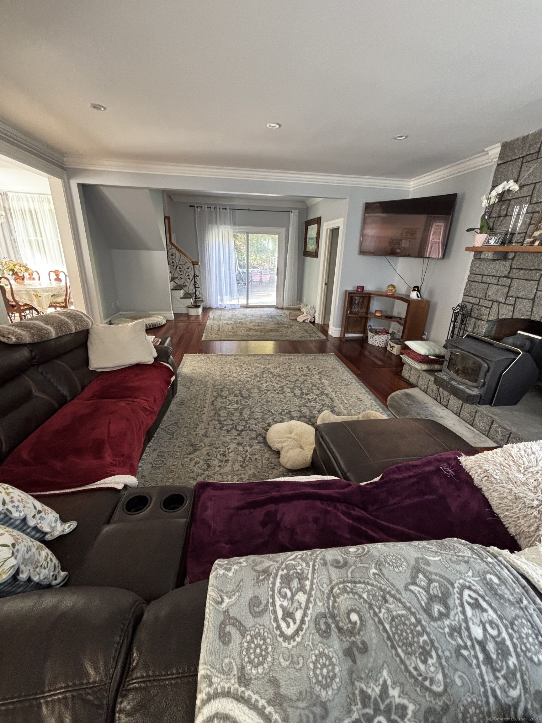 26 Olmstead Road Redding, CT 06896 - Photo 6 of 18 a living room with furniture and a flat screen tv