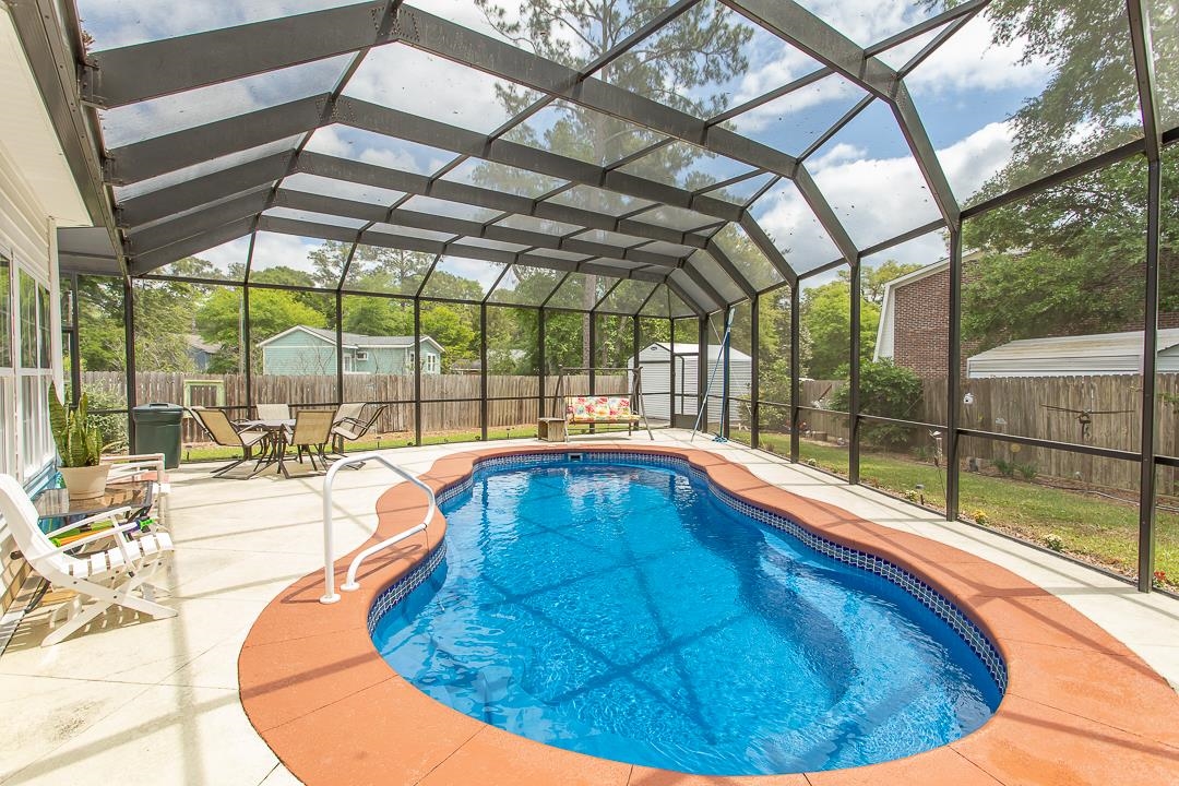 1630 Edgewood Drive Little River, SC 29566 - Photo 25 of 39 Previous photo with pool uncovered and prior to installation of vinyl fencing