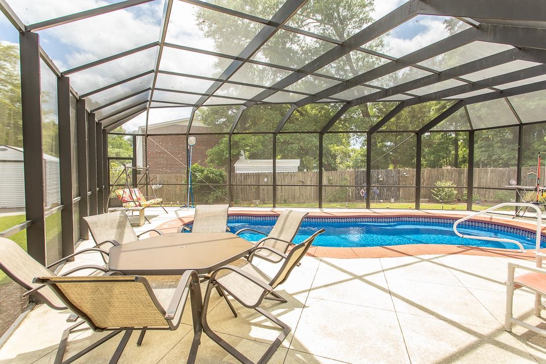 1630 Edgewood Drive Little River, SC 29566 - Photo 26 of 39 Previous photo with pool uncovered and prior to installation of vinyl fencing
