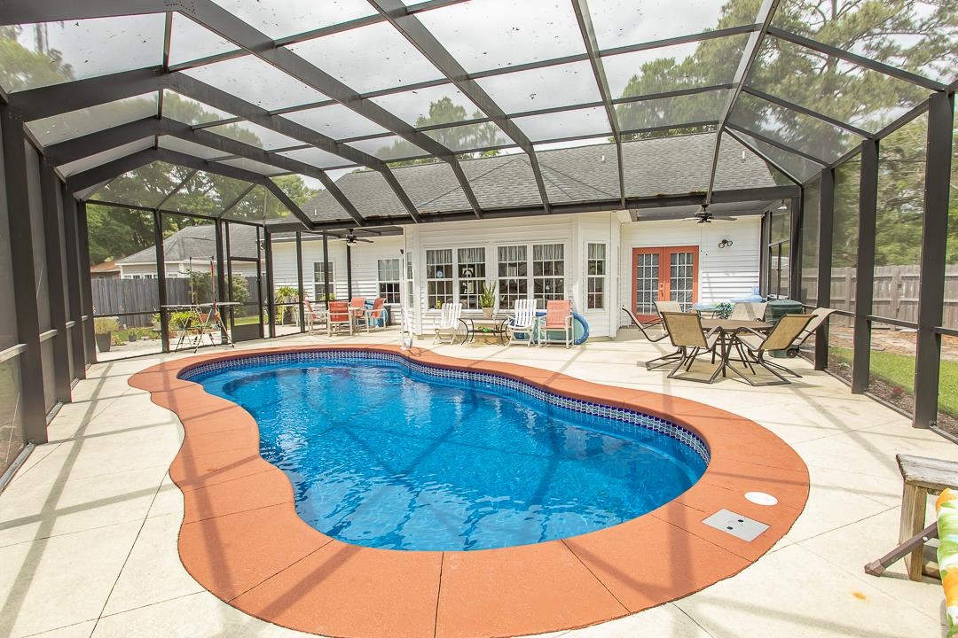 1630 Edgewood Drive Little River, SC 29566 - Photo 27 of 39 Previous photo with pool uncovered and prior to installation of vinyl fencing