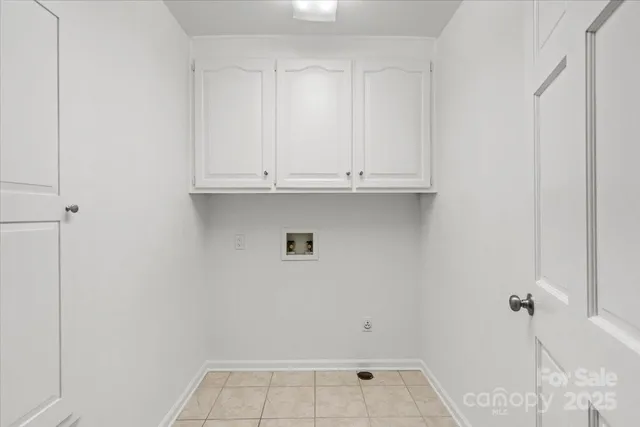 a view of kitchen with furniture and a window