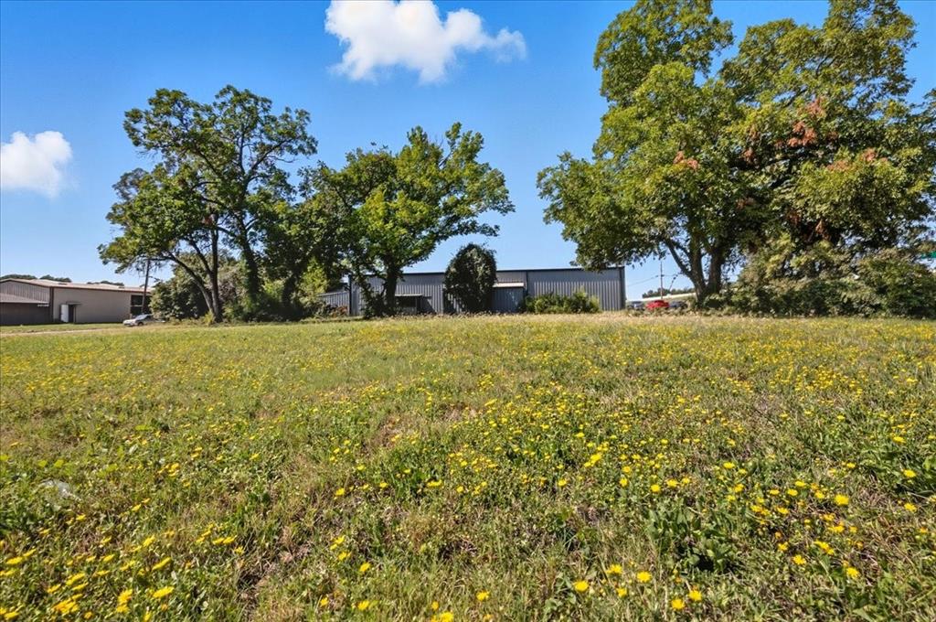 201 North Riverside Drive Fort Worth, TX 76111 - Photo 8 of 15 a view of a house with a yard