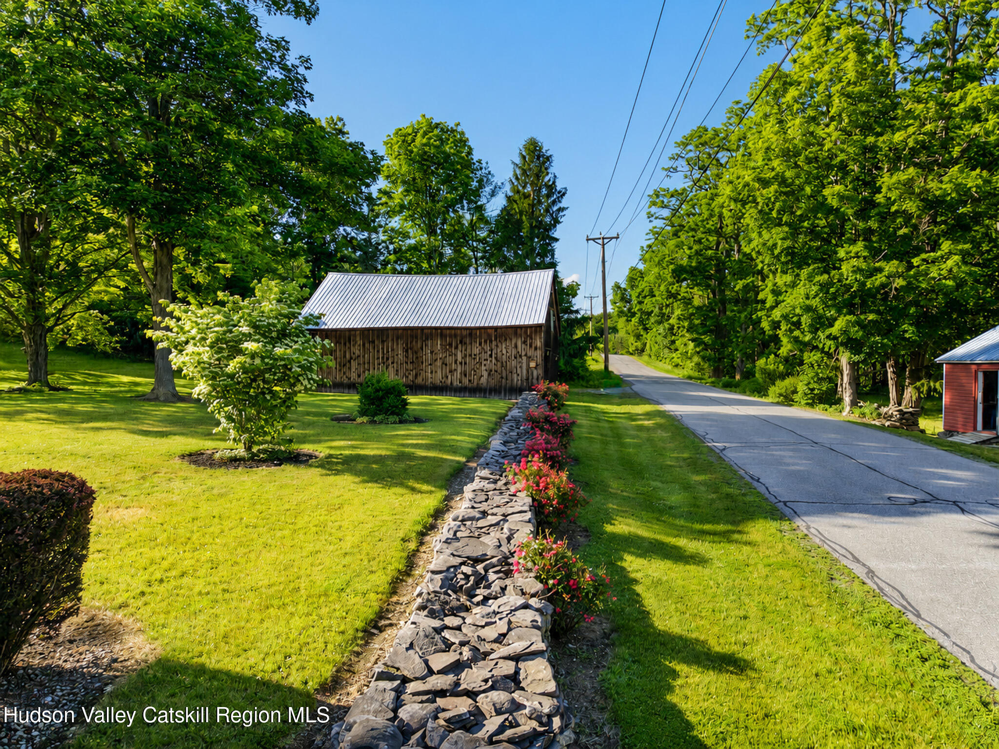 221 Camp Medusa Road Rensselaerville, NY 12120 - Photo 54 of 57 a view of a backyard with a garden