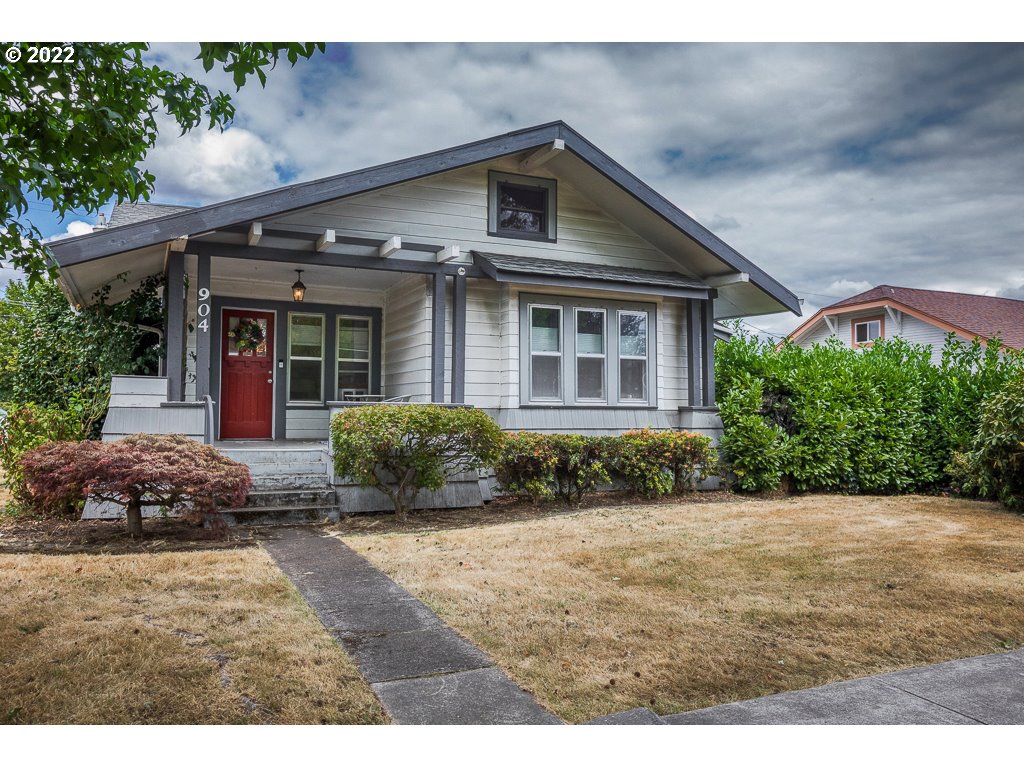 904 E Street Springfield, OR 97477 - Photo 1 of 31 a front view of a house with a yard