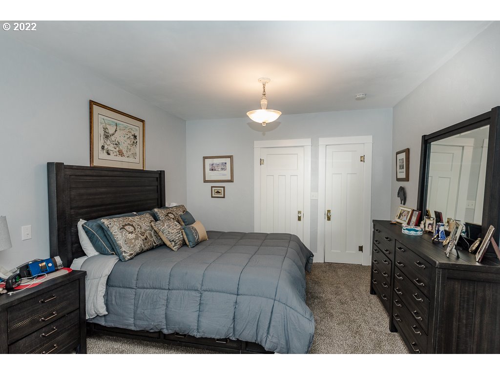 904 E Street Springfield, OR 97477 - Photo 17 of 31 a bedroom with a bed and dressers