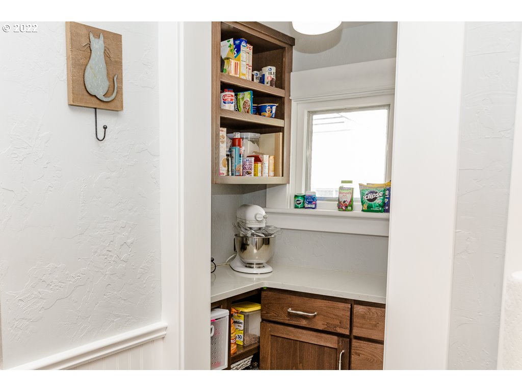 904 E Street Springfield, OR 97477 - Photo 22 of 31 a kitchen with a sink cabinets and a window
