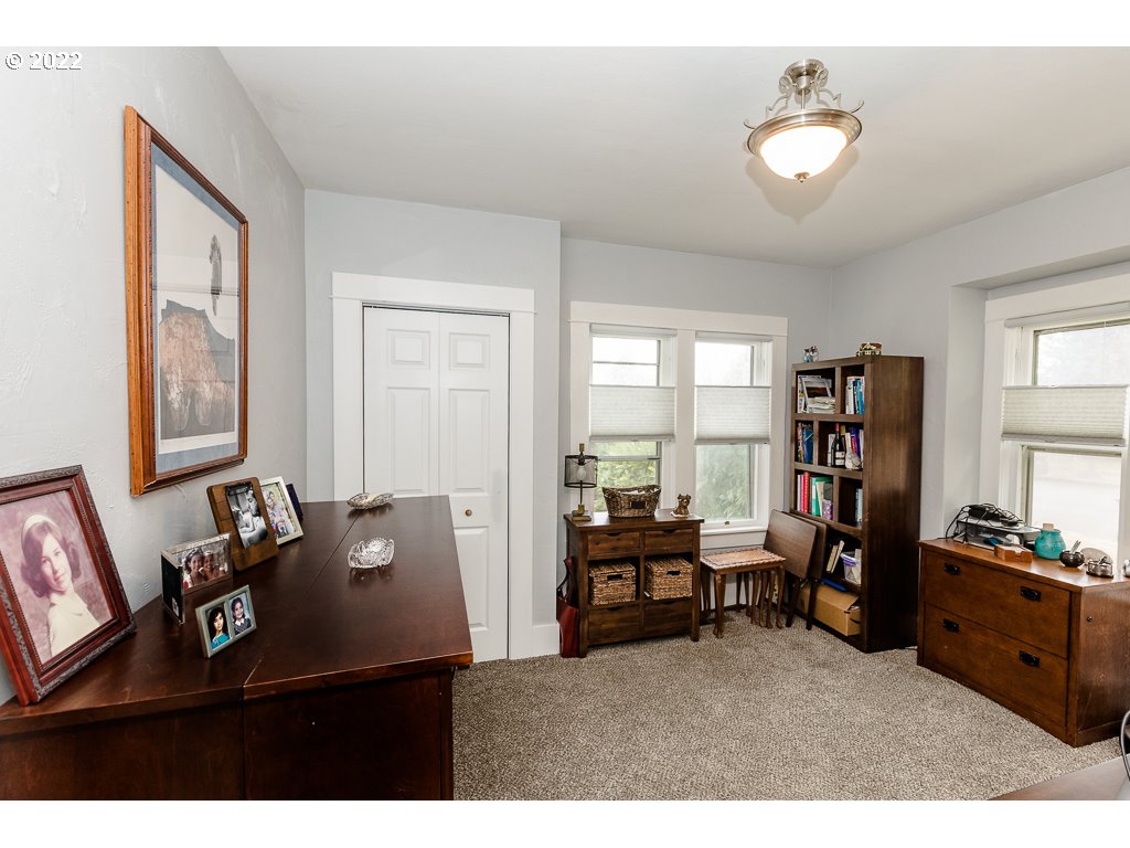 904 E Street Springfield, OR 97477 - Photo 10 of 31 a living room with furniture and a window