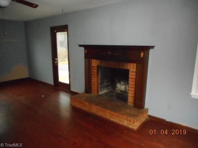 813 Buck Fork Road Dobson, NC 27017 - Photo 7 of 18 Living Room Fireplace