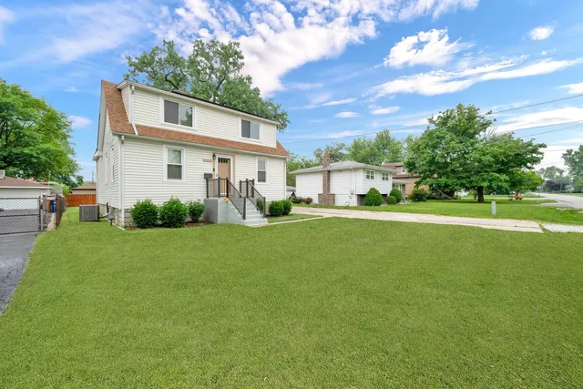 a backyard of a house with lots of green space