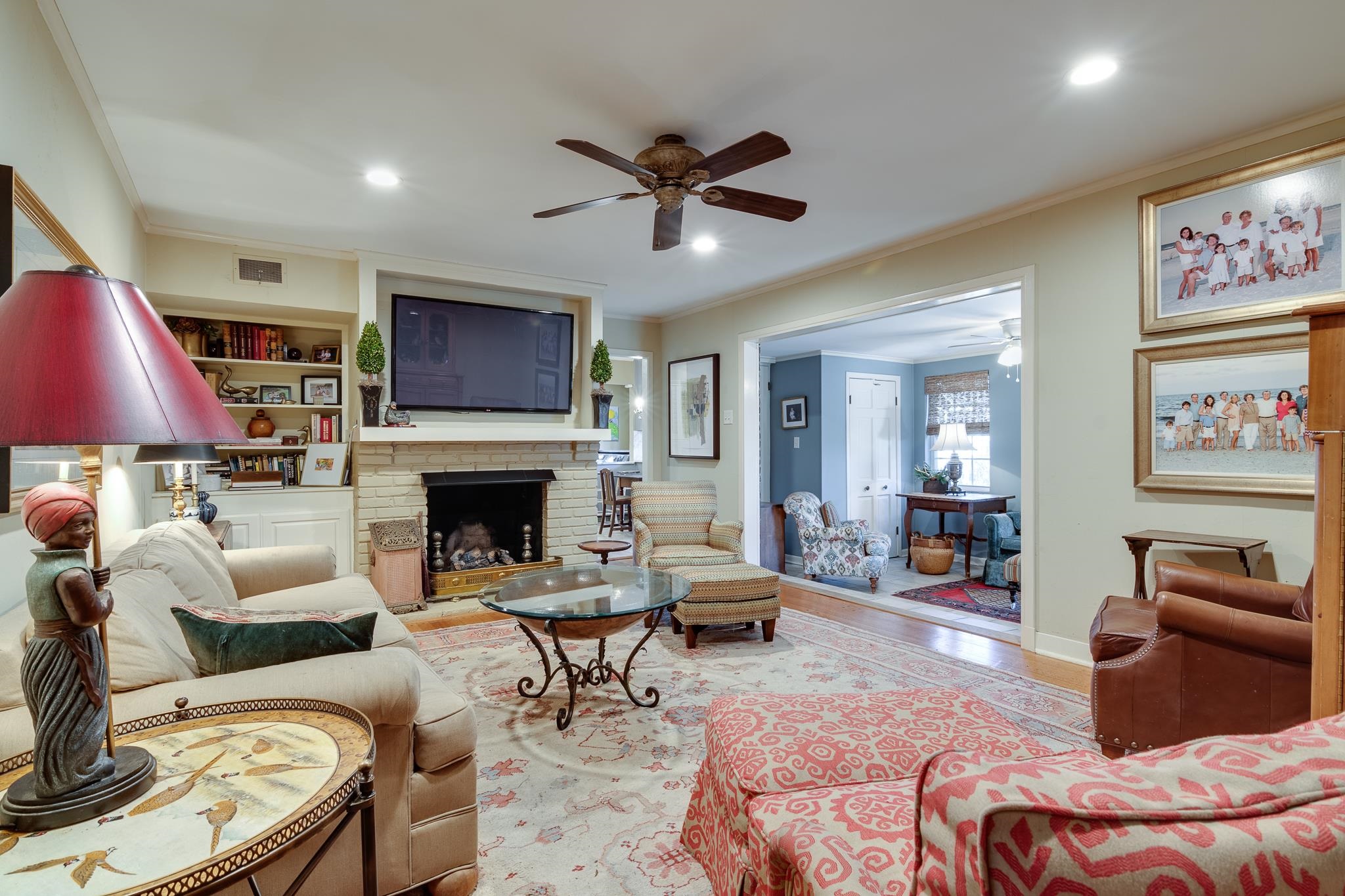 286 North Perkins Road Memphis, TN 38117 - Photo 11 of 25 a living room with furniture a flat screen tv and a fireplace