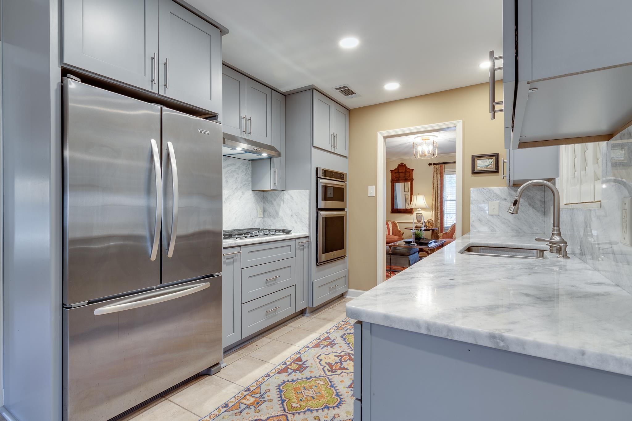 286 North Perkins Road Memphis, TN 38117 - Photo 5 of 25 a kitchen with stainless steel appliances granite countertop a refrigerator and a sink