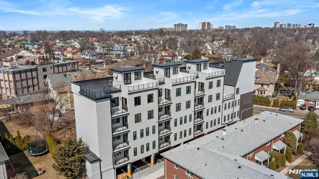 a view of a city with tall buildings