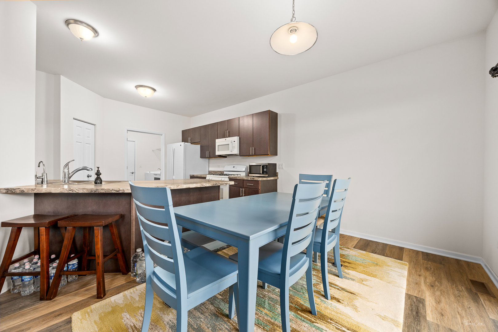 17340 Lucerne Court Lockport, IL 60441 - Photo 12 of 27 a view of a dining room with furniture and wooden floor