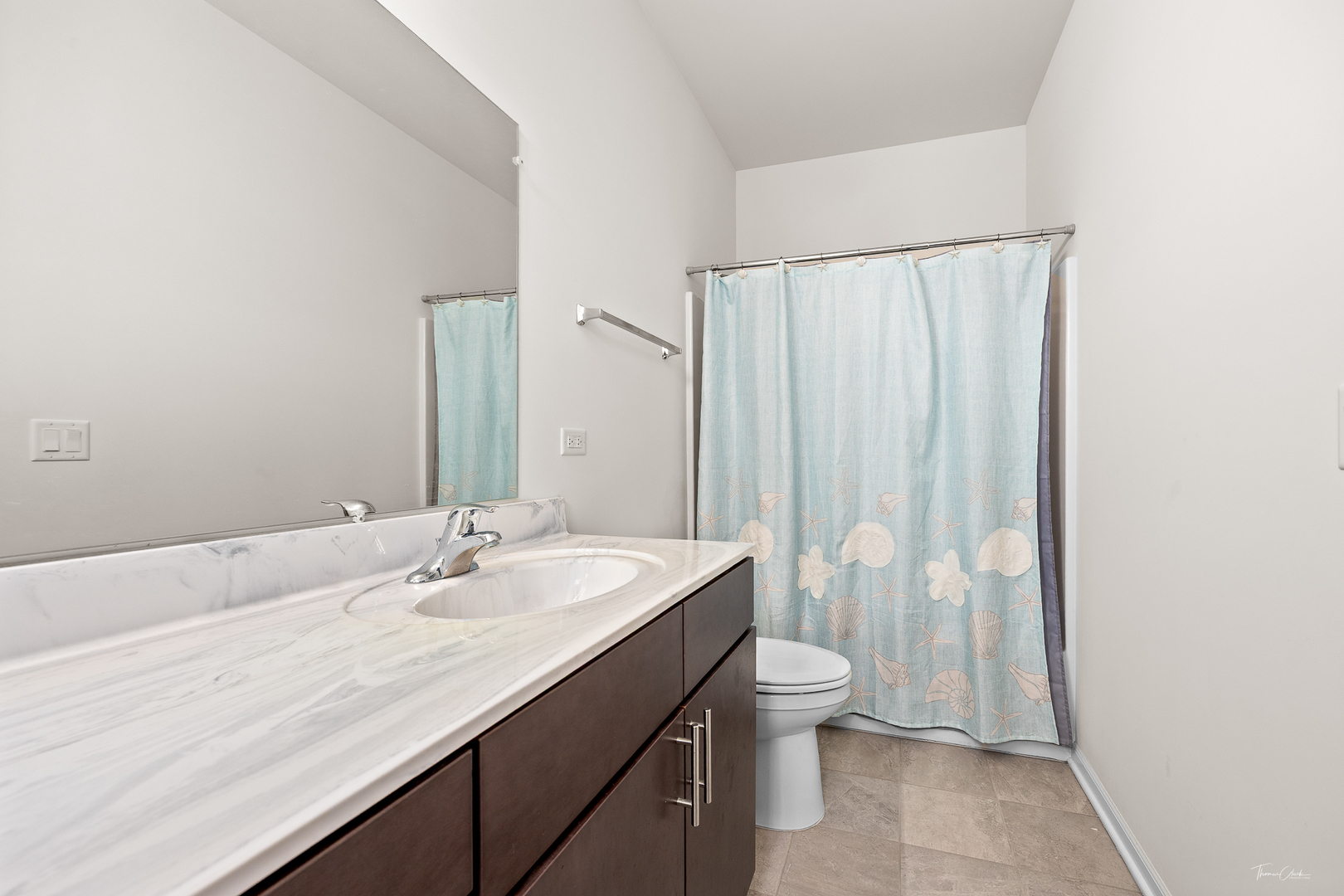 17340 Lucerne Court Lockport, IL 60441 - Photo 15 of 27 a bathroom with a sink a toilet and a mirror