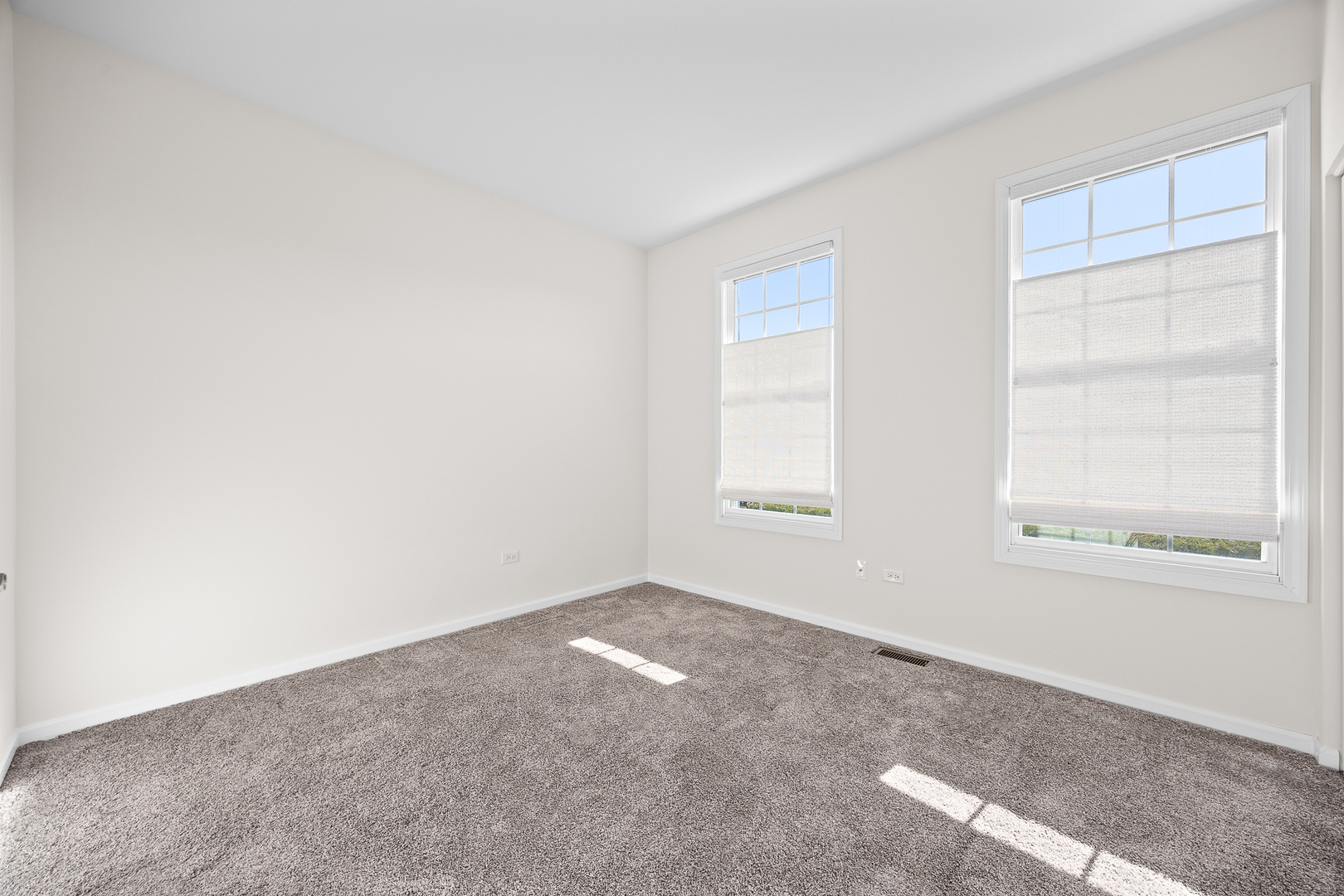 17340 Lucerne Court Lockport, IL 60441 - Photo 16 of 27 an empty room with windows