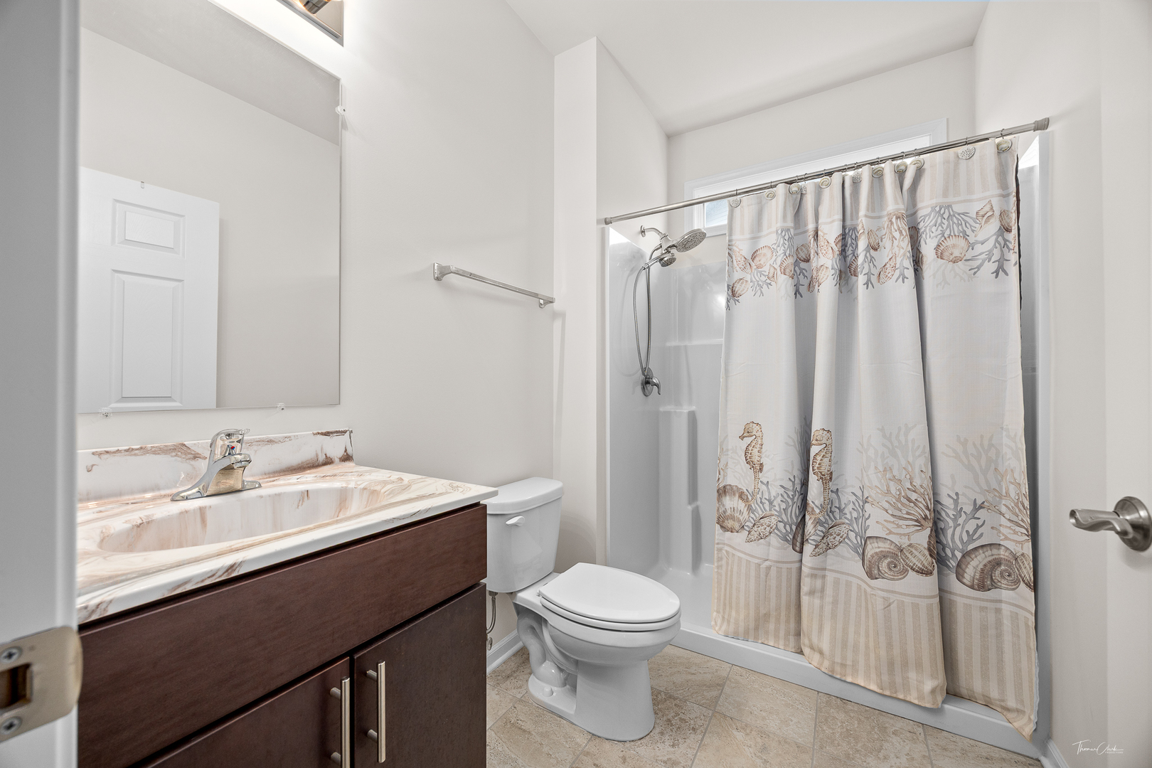 17340 Lucerne Court Lockport, IL 60441 - Photo 17 of 27 a bathroom with a sink a toilet and shower