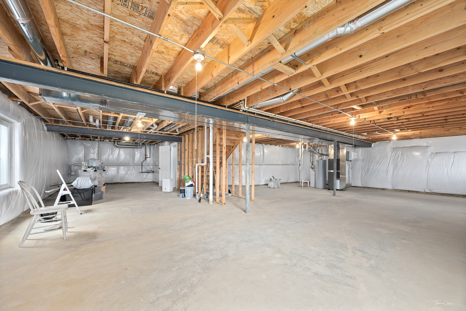 17340 Lucerne Court Lockport, IL 60441 - Photo 19 of 27 a view of an empty room with wooden roof
