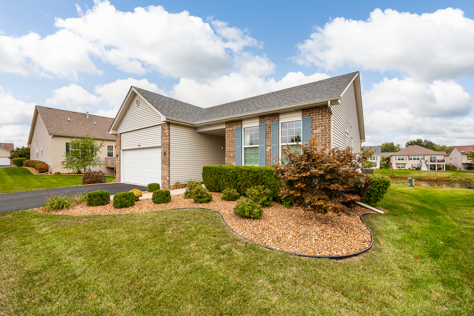 17340 Lucerne Court Lockport, IL 60441 - Photo 2 of 27 a view of a house with a backyard porch and sitting area