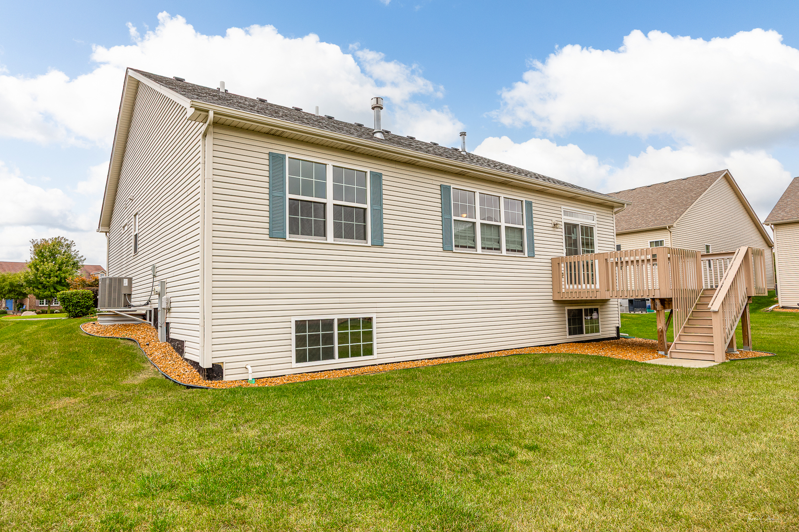 17340 Lucerne Court Lockport, IL 60441 - Photo 25 of 27 a view of a house with a yard and sitting area