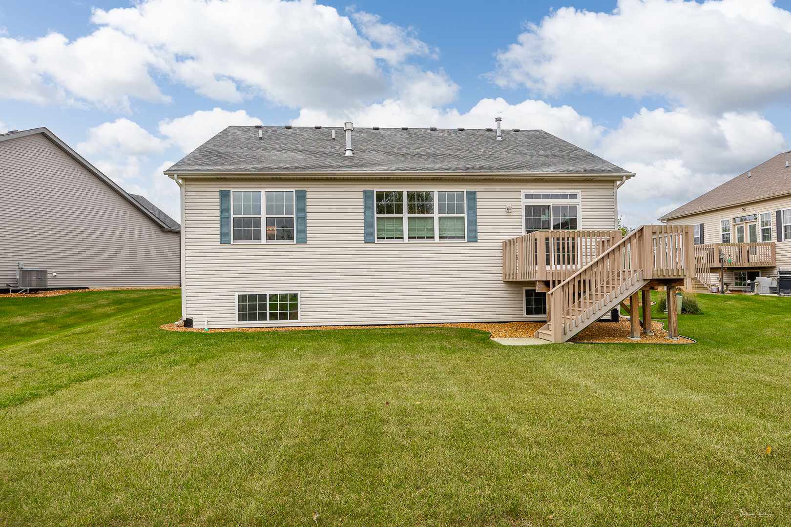 17340 Lucerne Court Lockport, IL 60441 - Photo 26 of 27 a view of a house with a yard and sitting area