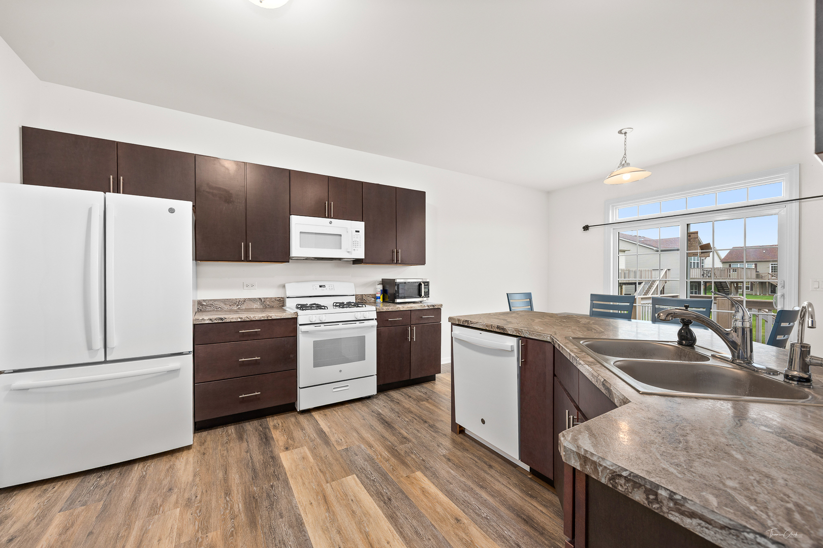 17340 Lucerne Court Lockport, IL 60441 - Photo 9 of 27 a kitchen with a sink stove and refrigerator