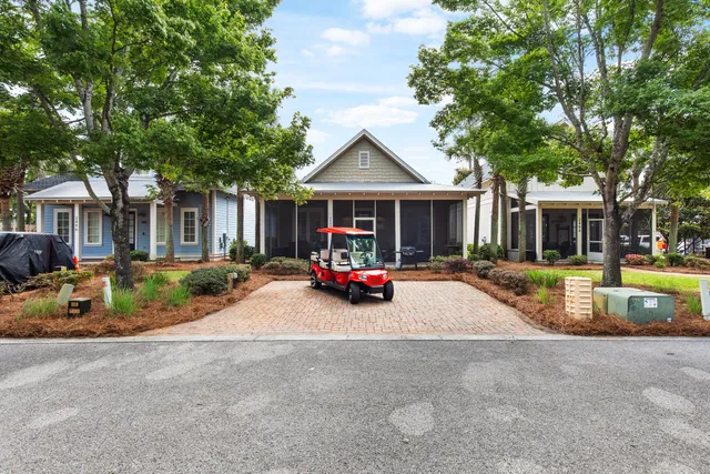 a view of a parked cars in front of house