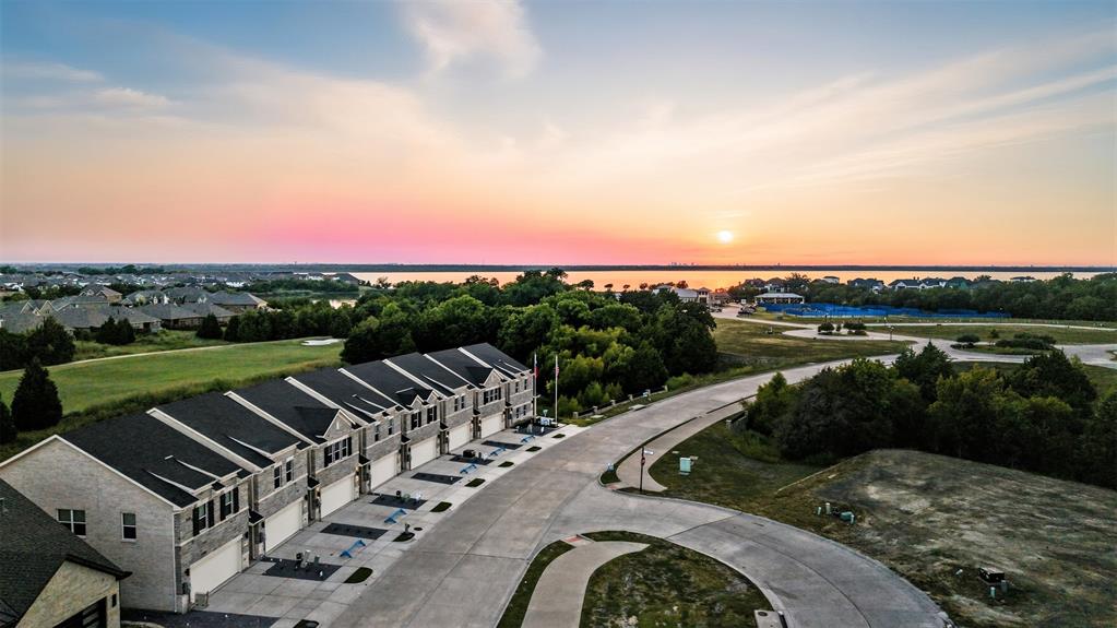 1622 Governors Boulevard Forney, TX 75126 - Photo 32 of 38 a view of a lake with a yard