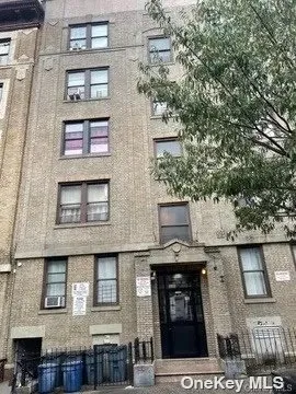 a front view of a building with balcony