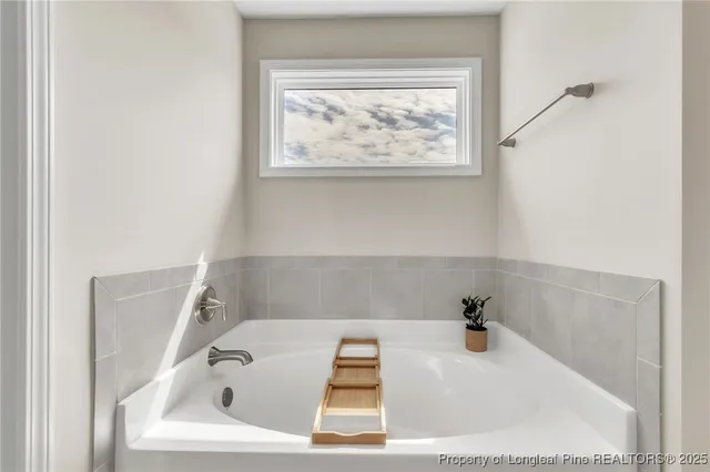 a bathroom with a bathtub
