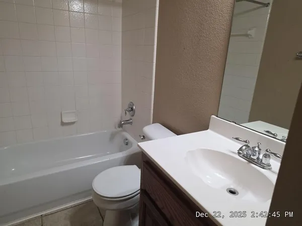 a bathroom with a sink and a toilet