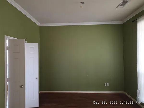 a view of small space with wooden floor