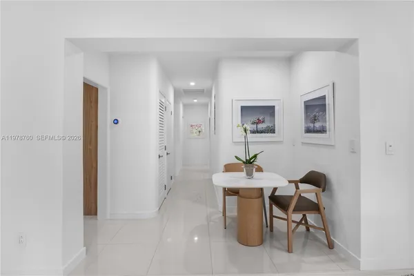 a workspace with furniture and window