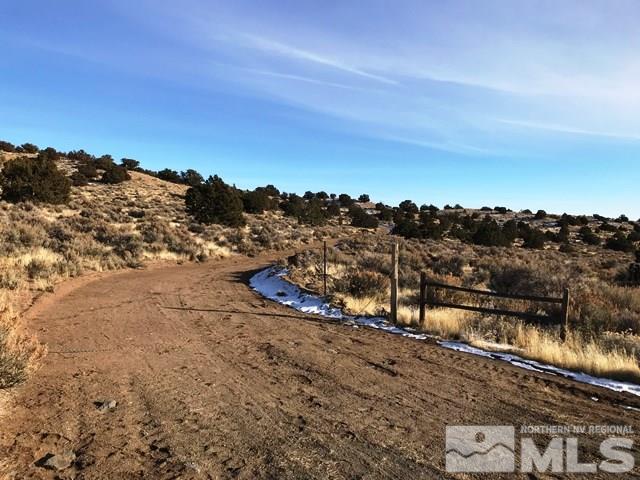 120 Columbia Hill Court, Unit RENO Reno, NV 89508 - Photo 2 of 6 a view of a lake with mountain