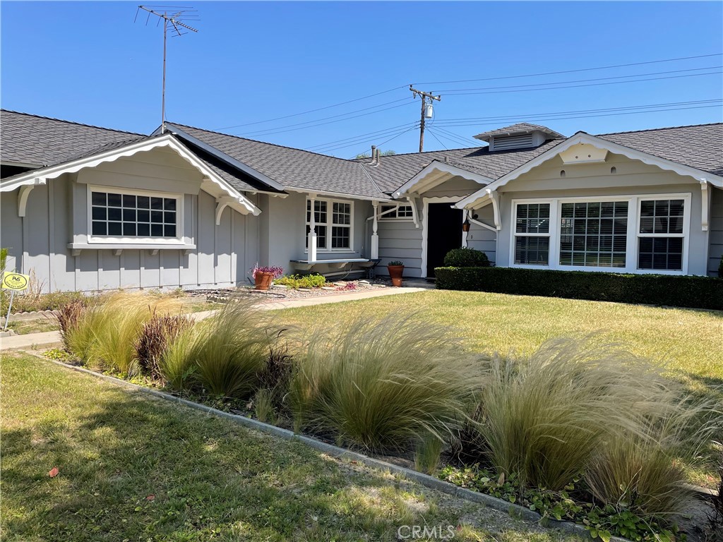 3001 Coleridge Drive Rossmoor, CA 90720 - Photo 2 of 25 a front view of a house with a yard